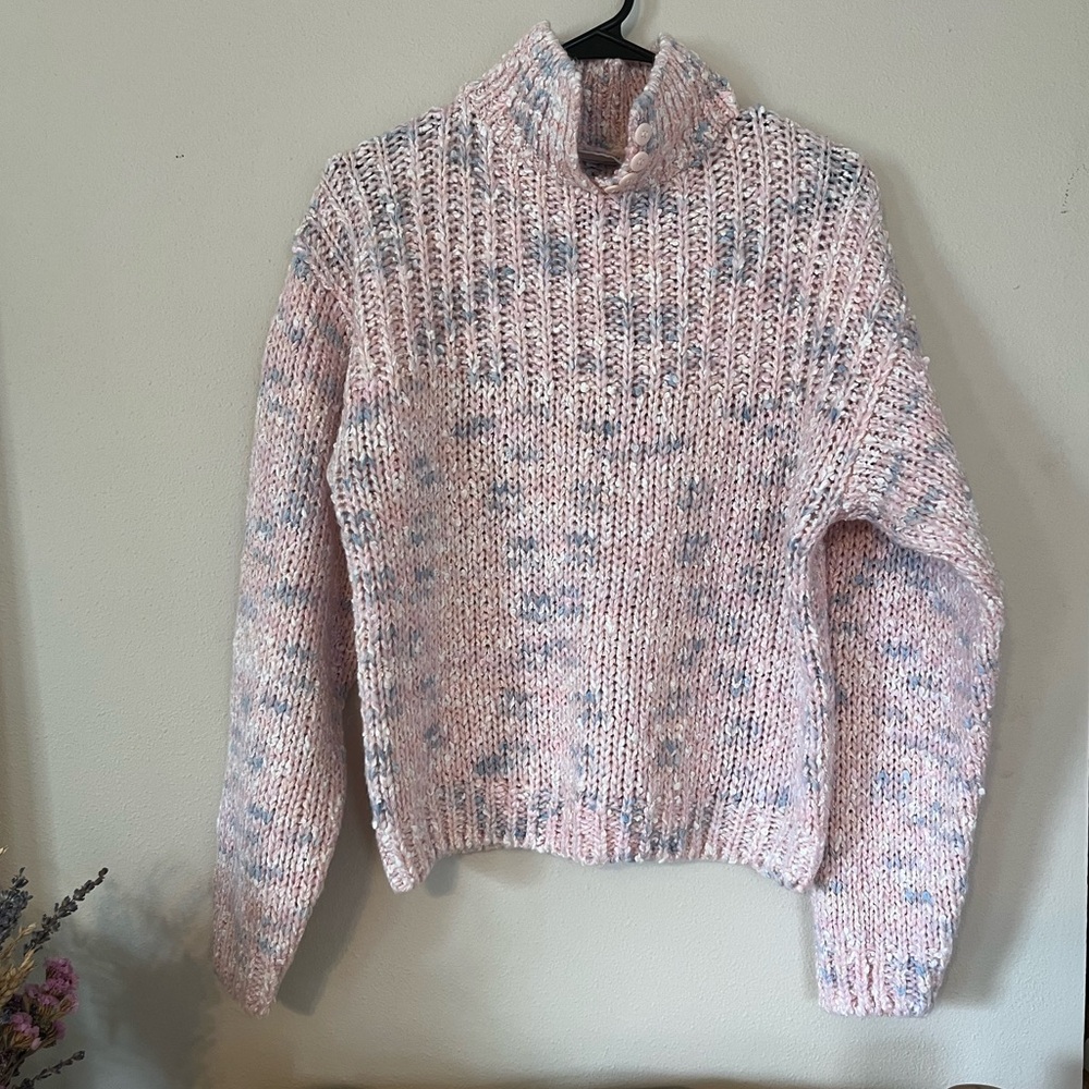 Vintage pink sweater with button detail!